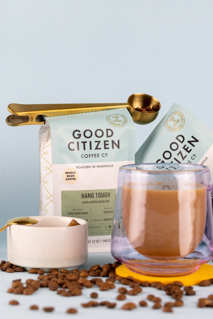 coffee bag with cup of coffee and clip