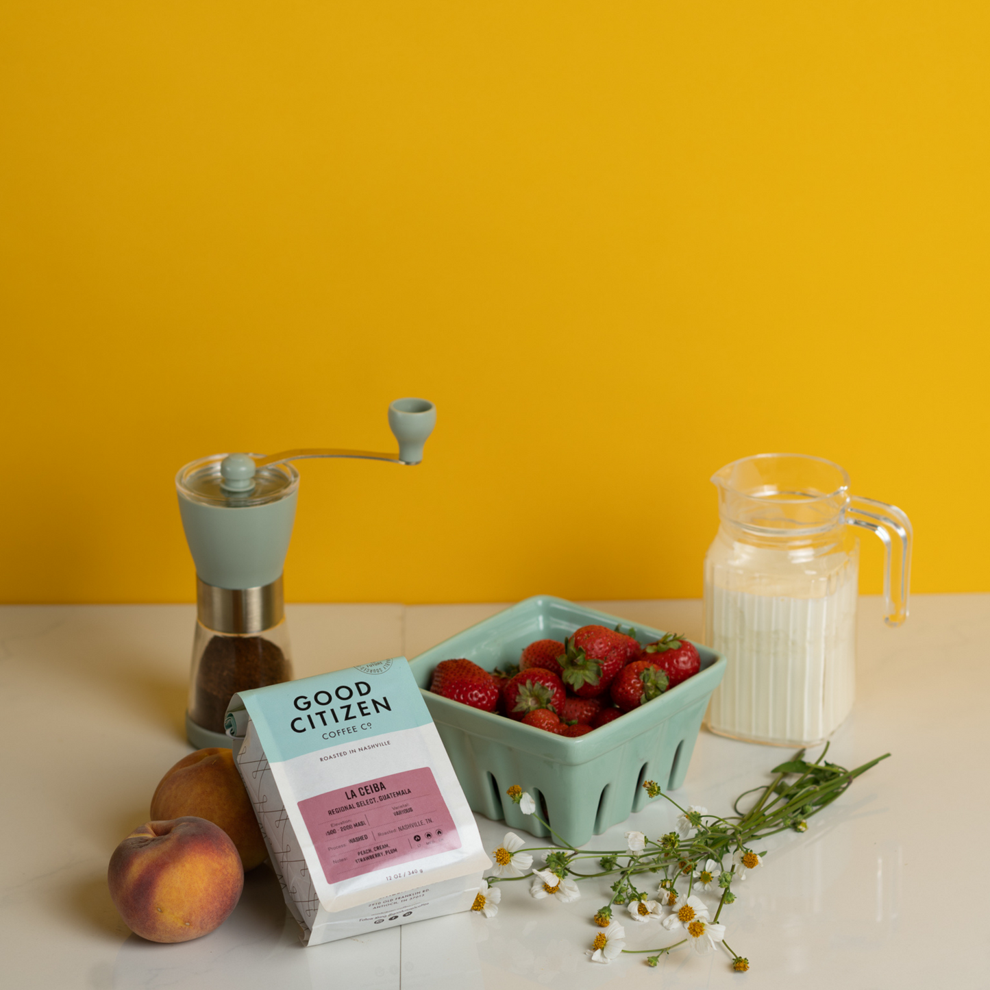 coffee bag next to fruit and milk