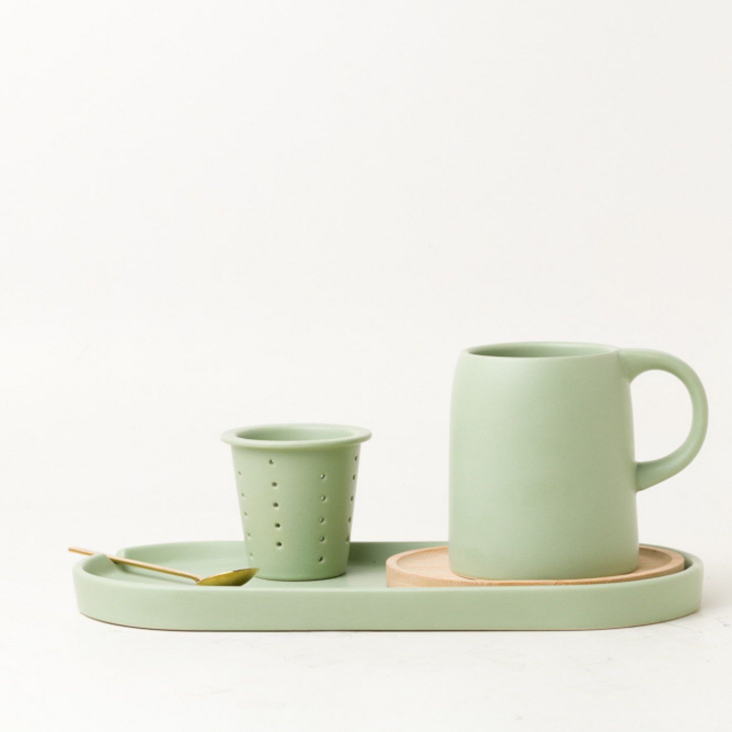 tray with a tea infuser mug on it