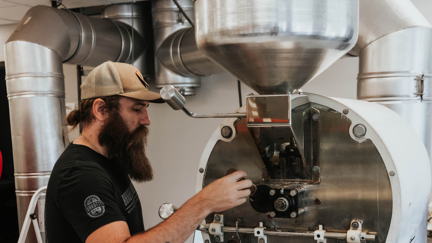 employee grinding beans