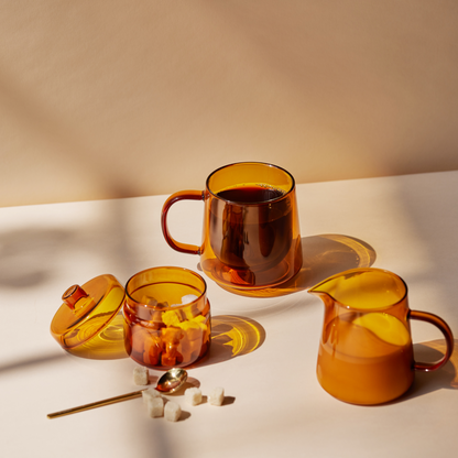 glass mugs with coffee in it