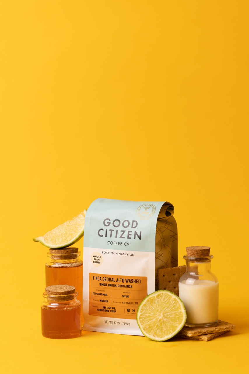 coffee bag with lemon, milk, and honey around it